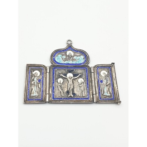 Russian silver religious deity with enamel inlays dated 1881...