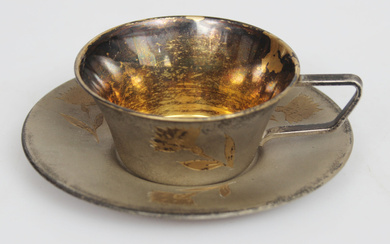 Silver cup with saucer Weight 123 grams. Cup height 3.5 cm, diameter 7.5 cm, saucer diameter 11 cm