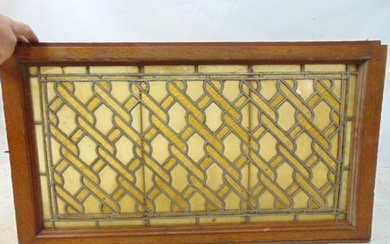 Single leaded window with chain link fence pattern, amber tints, window is 18" by 32", oak frame
