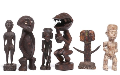 Six ancestor figures of carved patinated wood. Zande, Baulé, Chokwe style etc. H. 23–33 cm. (6)