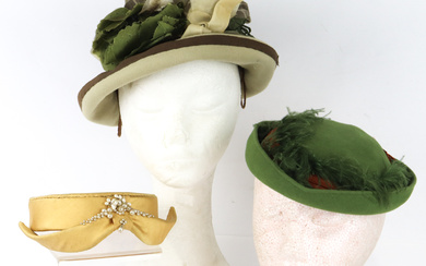 Three beautiful vintage hats in a card hatbox, one gold...
