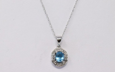 White Gold Blue Topaz Diamond Pendant.