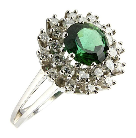 White gold ring with tourmaline and diamonds, German circa 1970, white gold 18 ct rhodium-plated, not hallmarked, tested, flower-shaped ring head with central green tourmaline, ca. 2.00 ct, surrounded by 24 brilliant-cut diamonds, ca. 0.72 ct, fine...