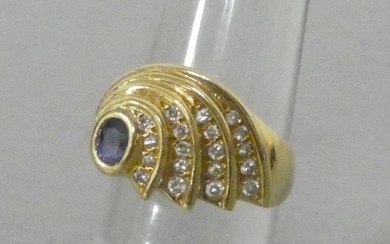 Yellow gold ring centered on an oval sapphire...