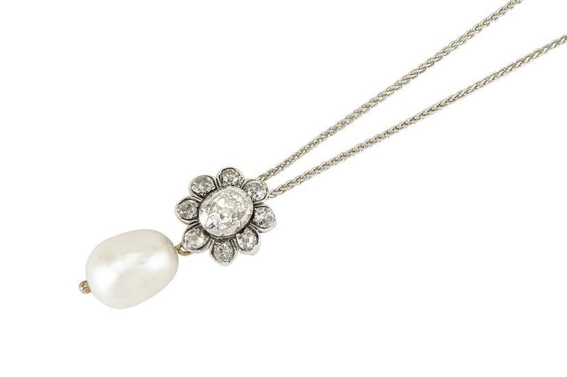 A cultured pearl and diamond pendant necklace The 10.2mm...