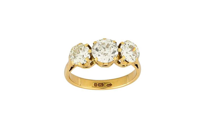 A diamond three-stone ring Set with three graduated old...