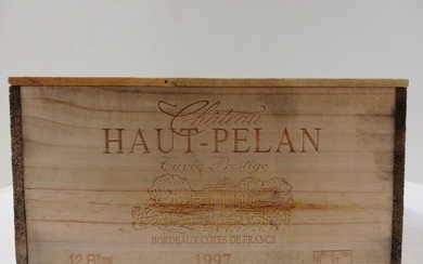 12 Btls Château Haut Pélan. 1997. Caisse bois d'origine. Cuvée prestige. Etat parfait