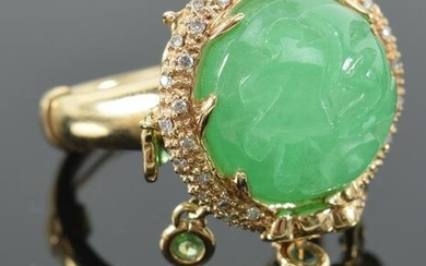 14K yellow gold carved jadeite and diamond halo ring.