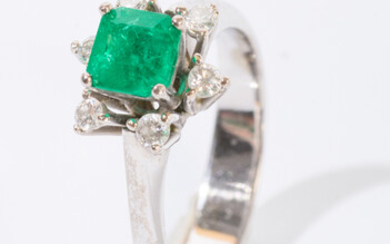 18K WHITE GOLD, EMERALD AND DIAMOND RING. Square-cut emerald weighing...