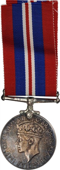 (1945) War medal, 1939-45. Silver, 36 mm. MY-186, BBM-141. Edge mount with straight bar suspension and ribbon. About Uncirculated.