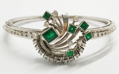 A retro Platinum Colombian emerald and diamond bracelet.