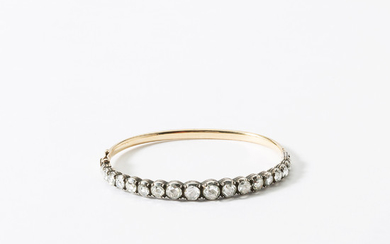 A 14 carat gold, silver and rose diamond bracelet