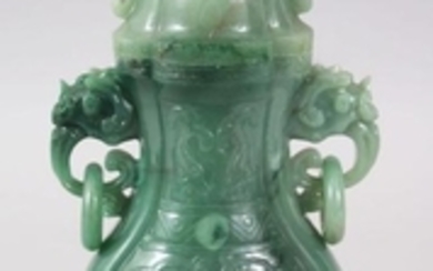 A 20TH CENTURY CHINESE CARVED JADE LIDDED VASE & STAND