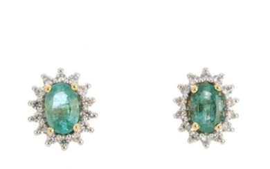 A pair of emerald and colourless gem earrings. Each