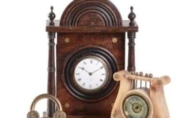 A mahogany and brass inlaid timepiece