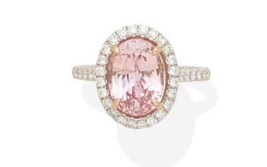 A padparadscha sapphire and diamond ring