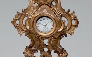 Porte montre en bois doré sculpté de putti dans un…