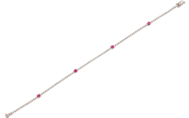 A ruby and diamond line bracelet Composed of...
