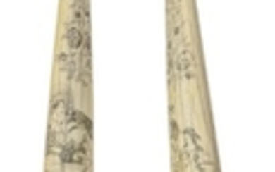 PAIR OF SCRIMSHAW WALRUS TUSKS Both with an elaborate floral vine above four vignettes. One tusk depicts a puppy jumping on a child...