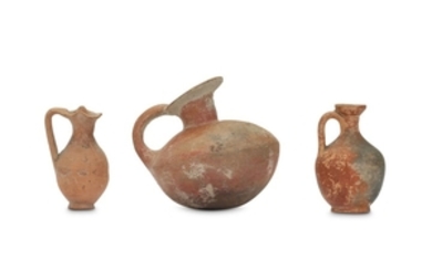 THREE ANCIENT POTTERY VESSELS Including a small terracotta...