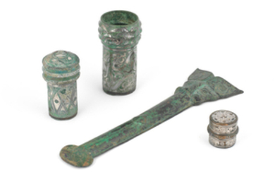 Three archaic silver-inlaid bronze chariot fittings