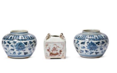 A COPPER-RED-DECORATED 'FLORAL' JAR AND A PAIR OF SMALL BLUE AND WHITE ‘LOTUS’ JARS, COPPER-RED-DECORATED JAR: YUAN DYNASTY (1279-1368) BLUE AND WHITE JARS: MING DYNASTY, 15TH CENTURY
