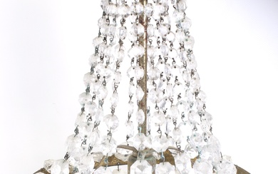 A 20th century tent and bag style crystal glass and brass chandelier. With a single electric light.