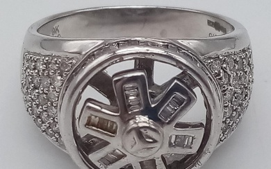 A 9K White Gold Diamond Cluster Ring. Futuristic design...