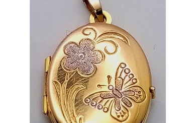 A 9K Yellow Gold Oval Locket Pendant. Decorative white gold ...