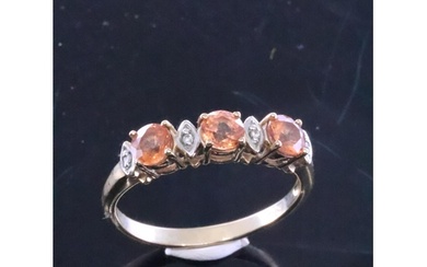 A 9ct gold gem set ring finger size N