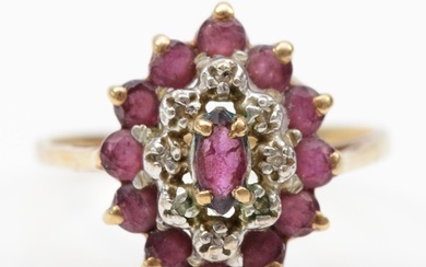 A 9ct gold ruby and eight cut diamond marquise dress ring, L...