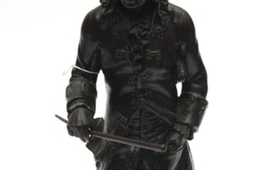 A BLACK LACQUERED CAST IRON FIGURE OF A GENTLEMAN