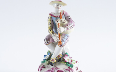 A BOW FIGURE OF HARLEQUIN