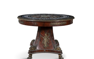 A BRASS MOUNTED CIRCULAR TABLE, 19TH CENTURY inset with la...