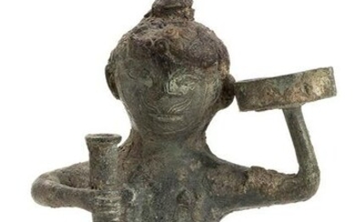 A BRONZE ANTROPOMORPHIC OIL LAMP China, Han dynasty
