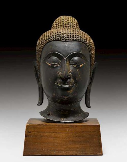 A BRONZE HEAD OF BUDDHA.