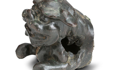 A CHINESE BRONZE LION DOG FRAGMENT