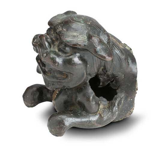 A CHINESE BRONZE LION DOG FRAGMENT