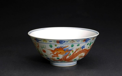 A CHINESE FAMILLE ROSE 'DRAGON AND PHOENIX' BOWL