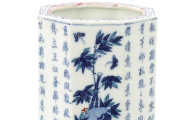 A CHINESE QING DYNASTY BLUE AND WHITE OCTAGONAL SHAPED...