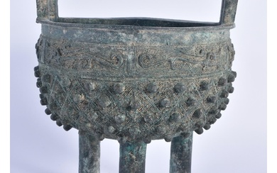 A CHINESE QING DYNASTY TWIN HANDLED BRONZE ARCHAIC CENSER. 8...