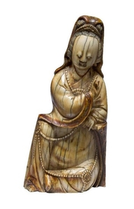 A Chinese ivory figure of Guanyin, Ming...