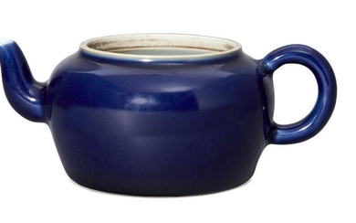 A Chinese porcelain monochrome blue-glazed teapot, Yongzheng...