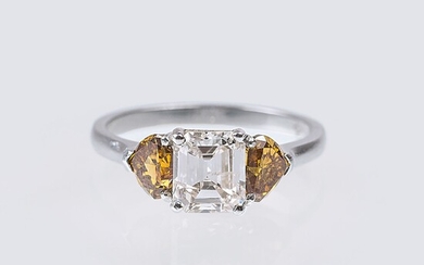 A Diamond Ring with Fancy Diamonds in Trillant Cut.