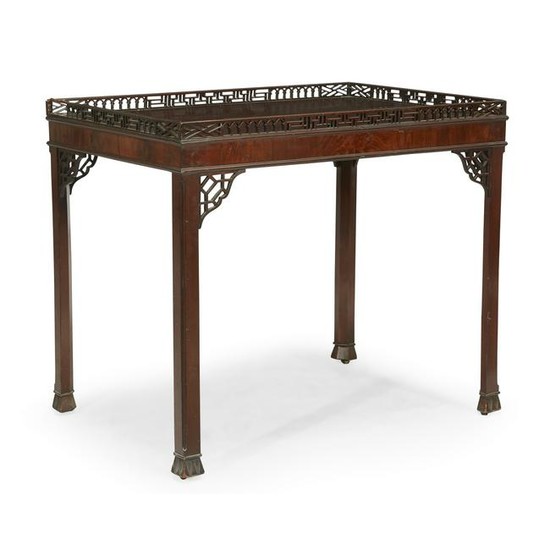 A George III style fretwork mahogany tea table, first