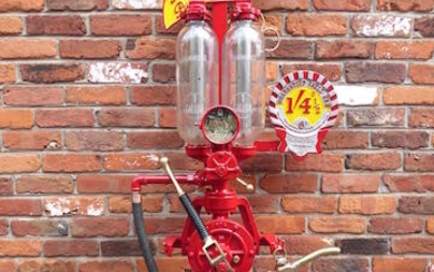 A Hammond two gallon visible hand-operated semi-rotary petrol pump