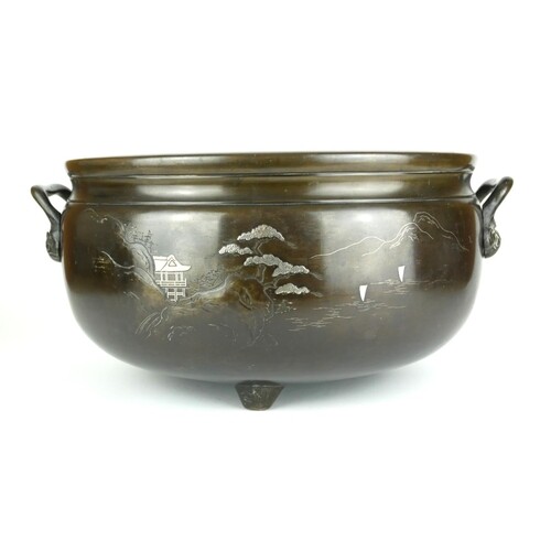 A LARGE CHINESE TWO HANDLED WHITE METAL INLAID BRONZE CENSOR...