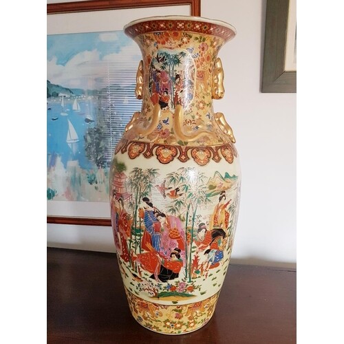 A Large Highly Decorated Oriental Floor Vase measuring 24 in...