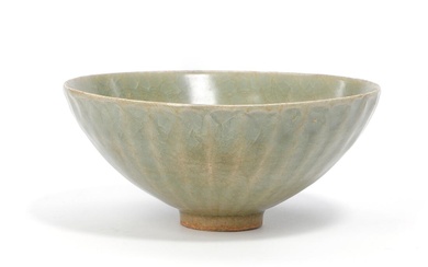 A Longquan celadon glazed ribbed bowl on a retracted narrow base with...