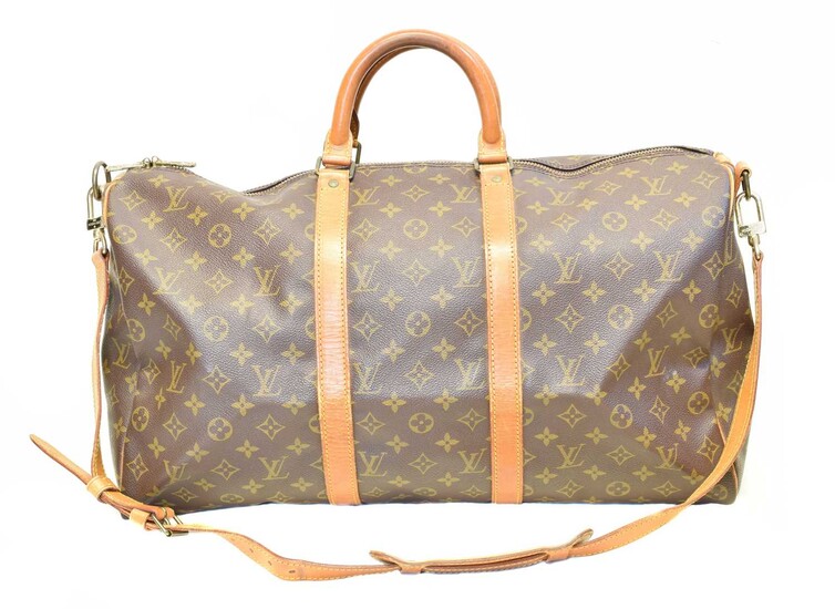 A Louis Vuitton monogram Keepall Bandoulière 55 luggage bag